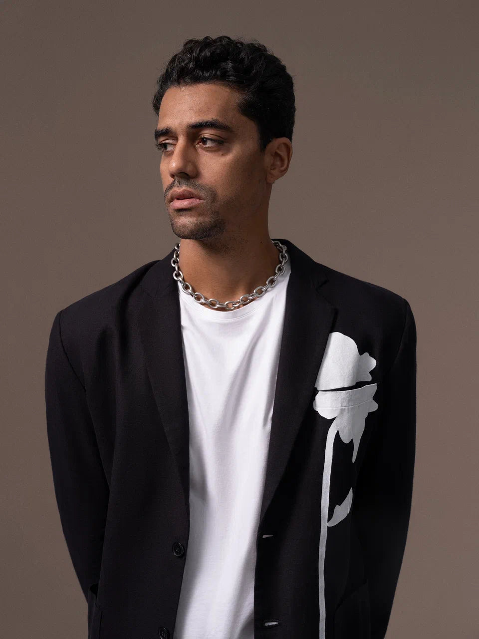 Black jacket with white flower