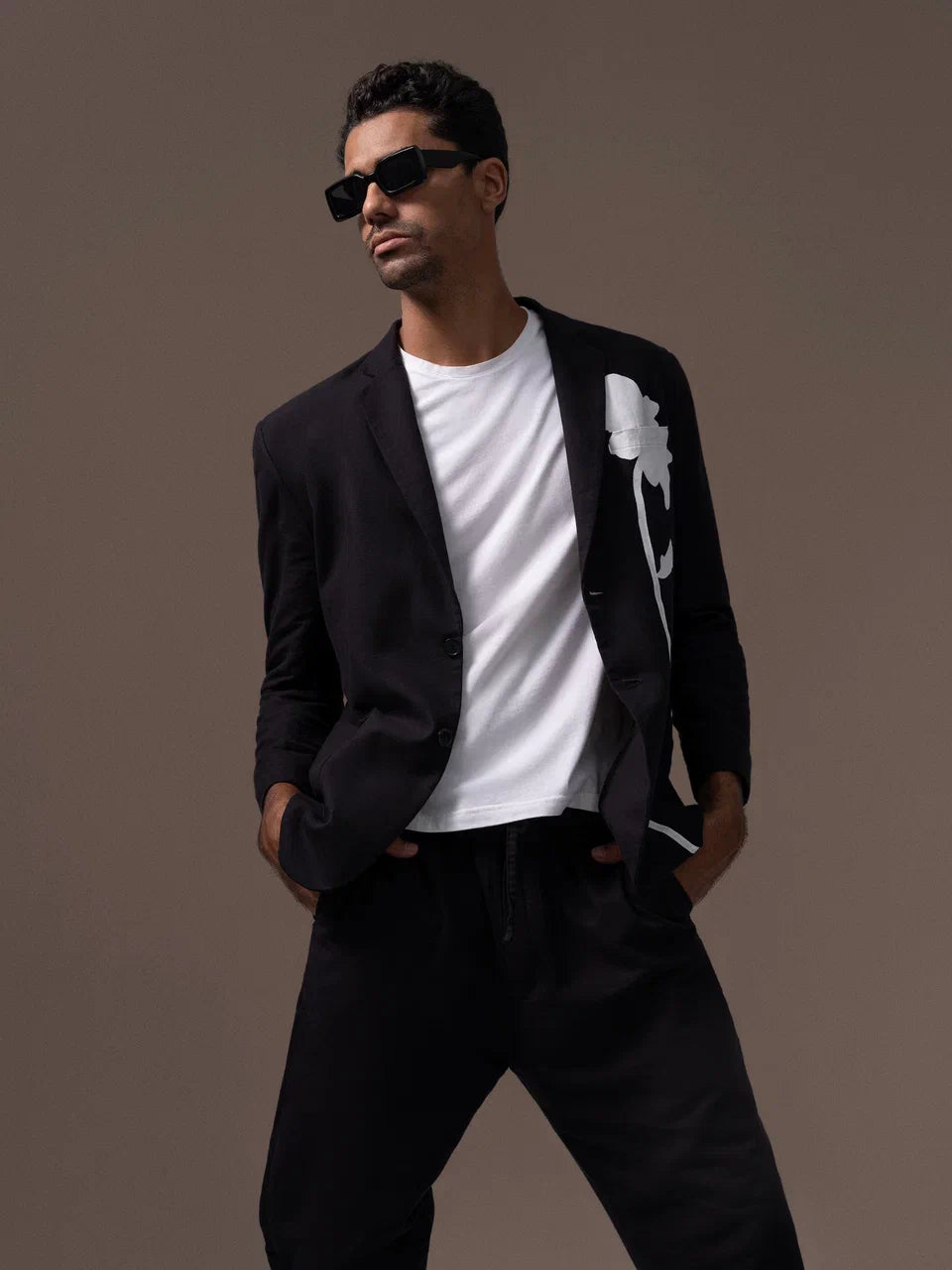 Black jacket with white flower