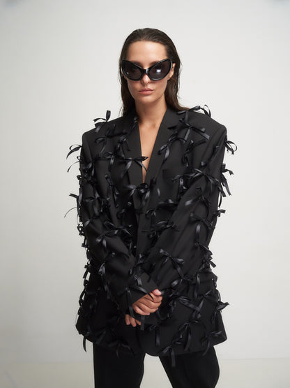 Black jacket small bows
