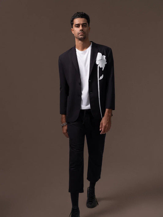 Black jacket with white flower